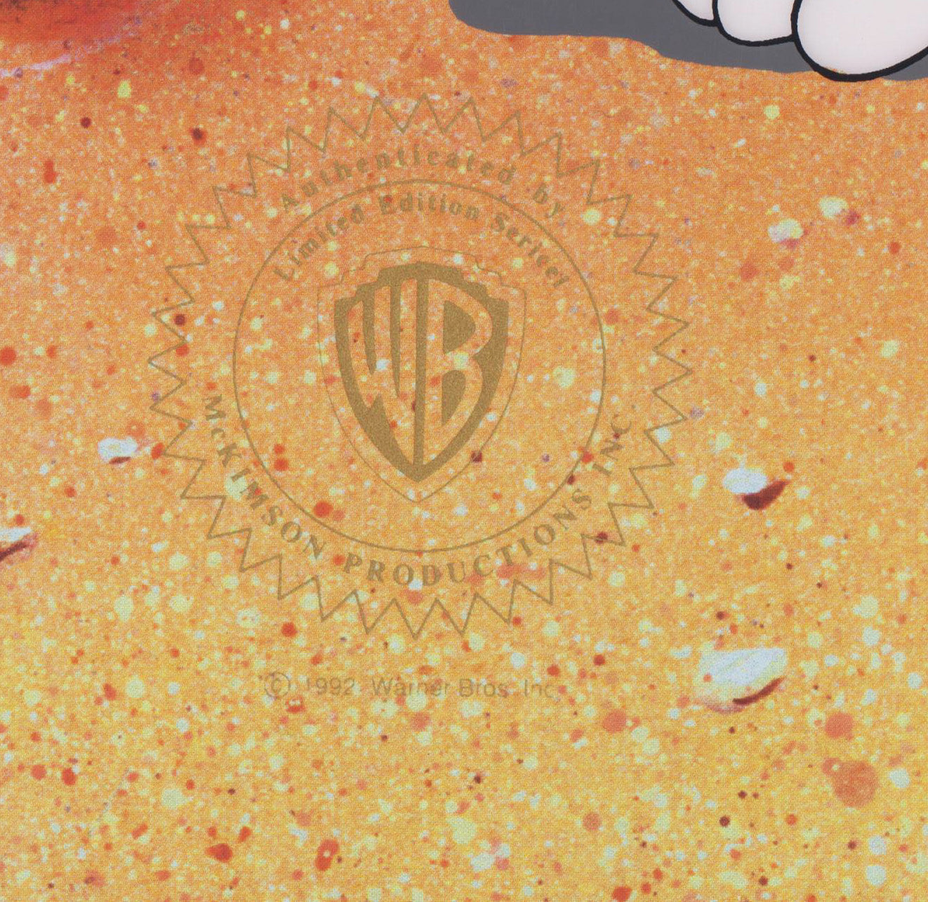 Loaded Hands Warner Bros Sericel with Official Warner Bros Seal of Authenticity